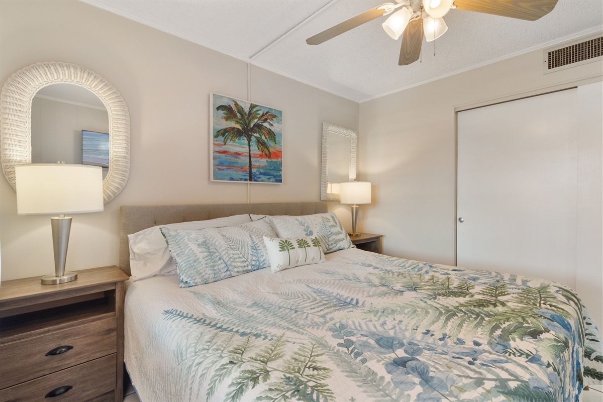 King size bed in bedroom.