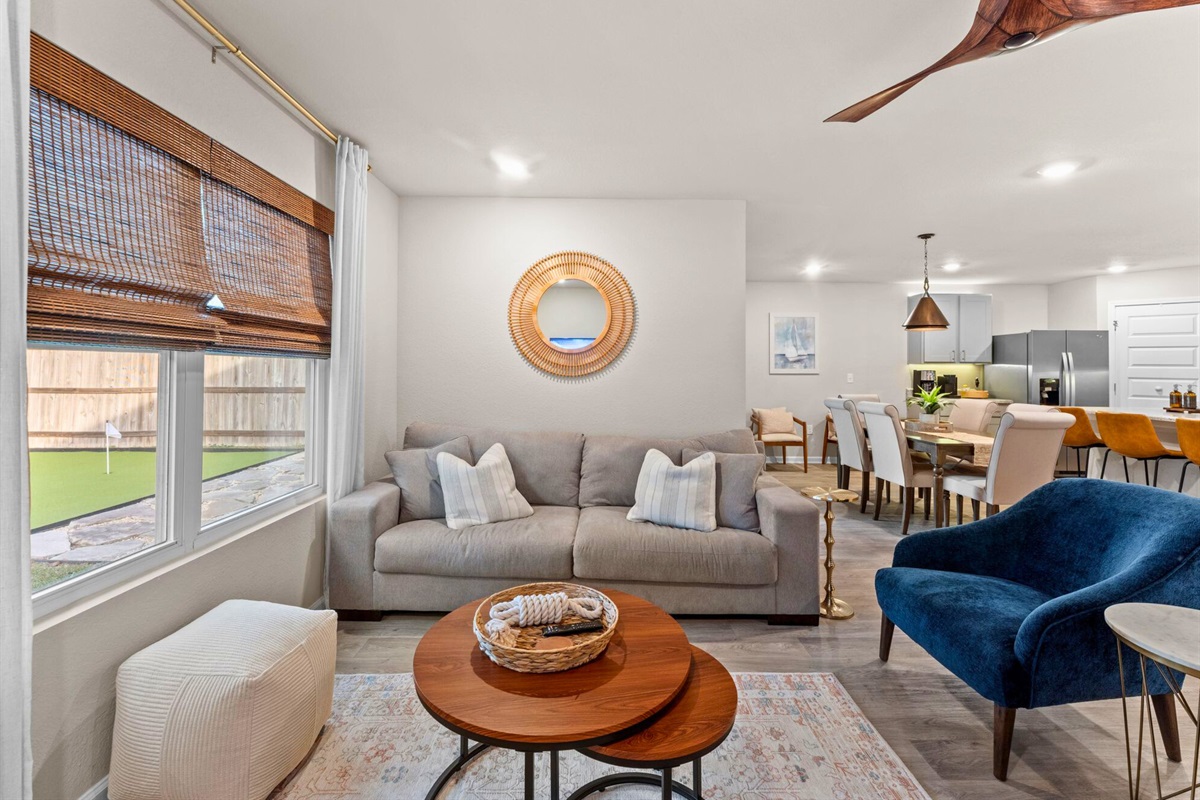 Natural light fills the space, creating a calm and inviting spot to watch TV, read, or catch up with family.