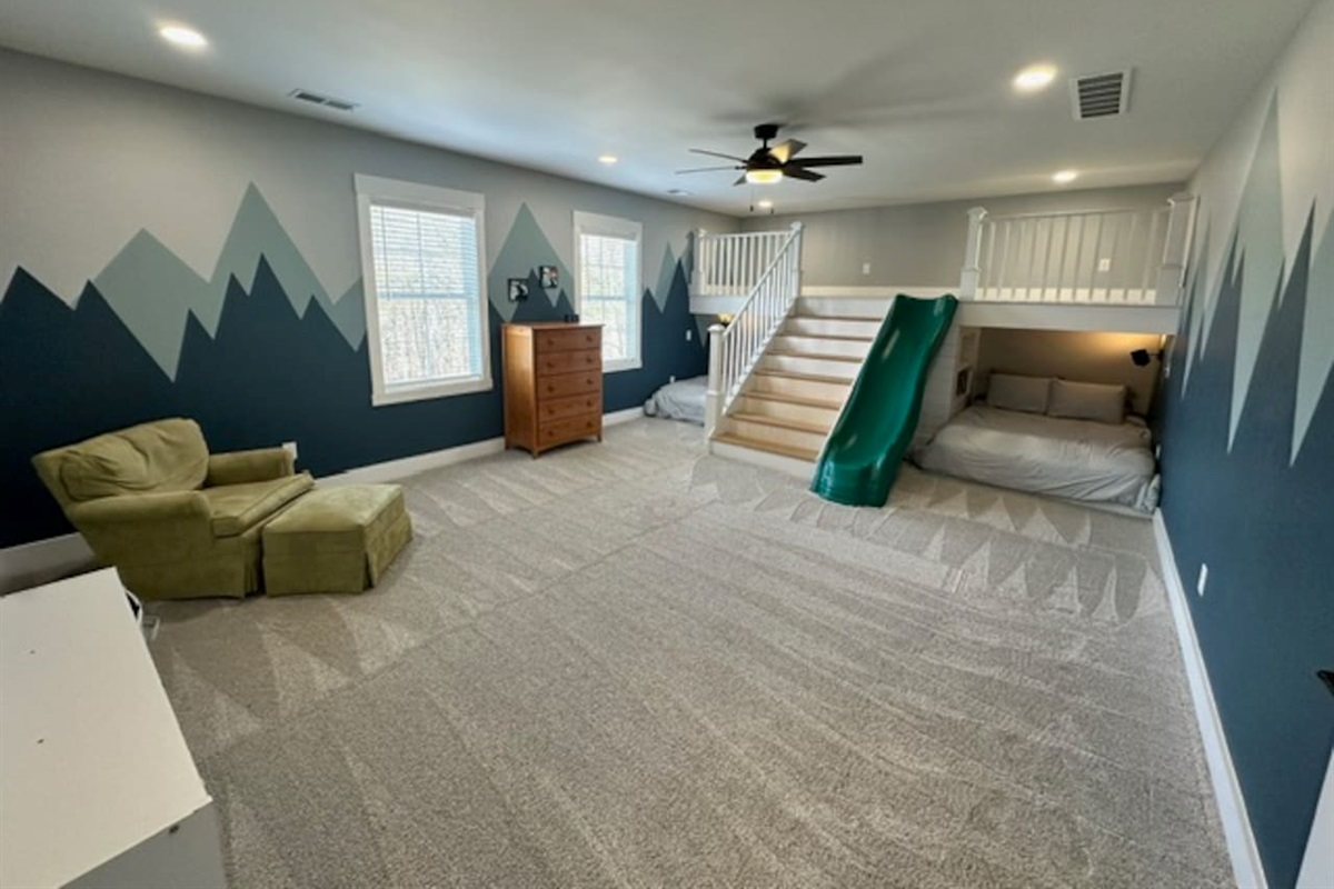 MASSIVE bedroom: 2 queen beds &  space to sleep on upper loft. Twin mattresses available upon request for additional beds. Plenty of space for pack n play (provided). Room has its own sink and shares private toilet and shower rooms with bedroom #3.