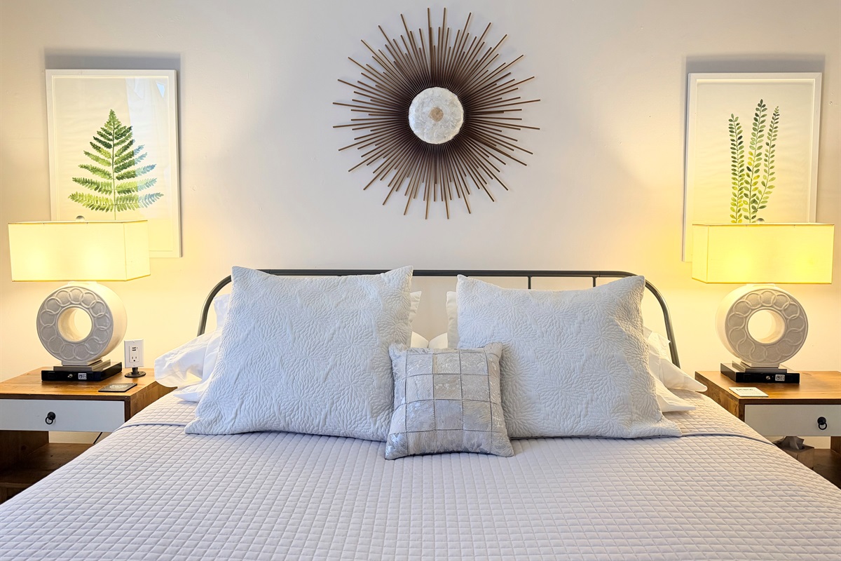 Comfort is a brand standard at The Urban Chalet - King bed with organic cotton lines, soft ambient lighting, and blackout shades designed for deep rest, and longer stays. 