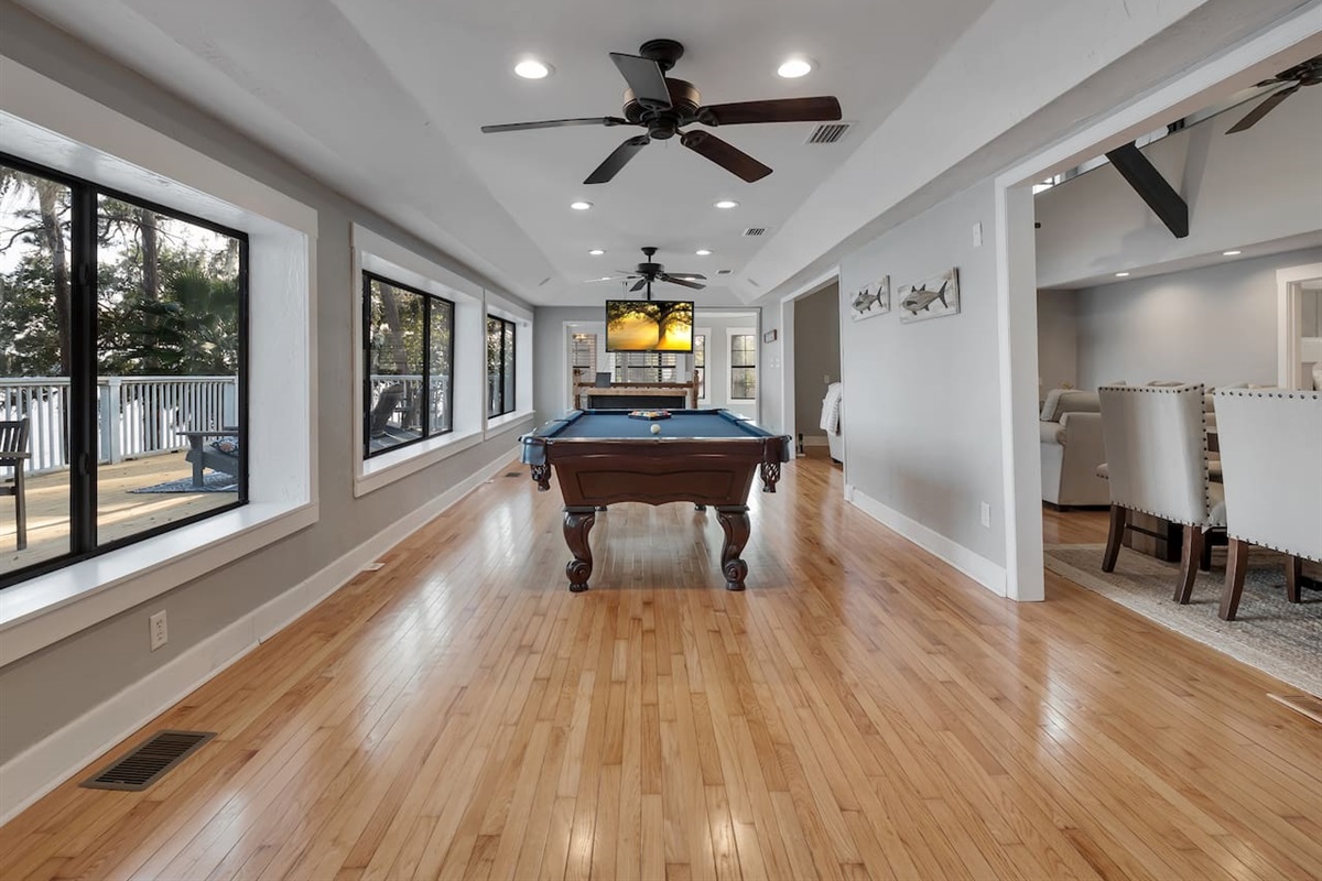 Pool table, lake view, stool seating, tv
