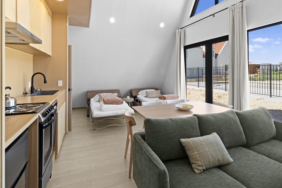 Main Room with Twin Sofa Beds Made Up