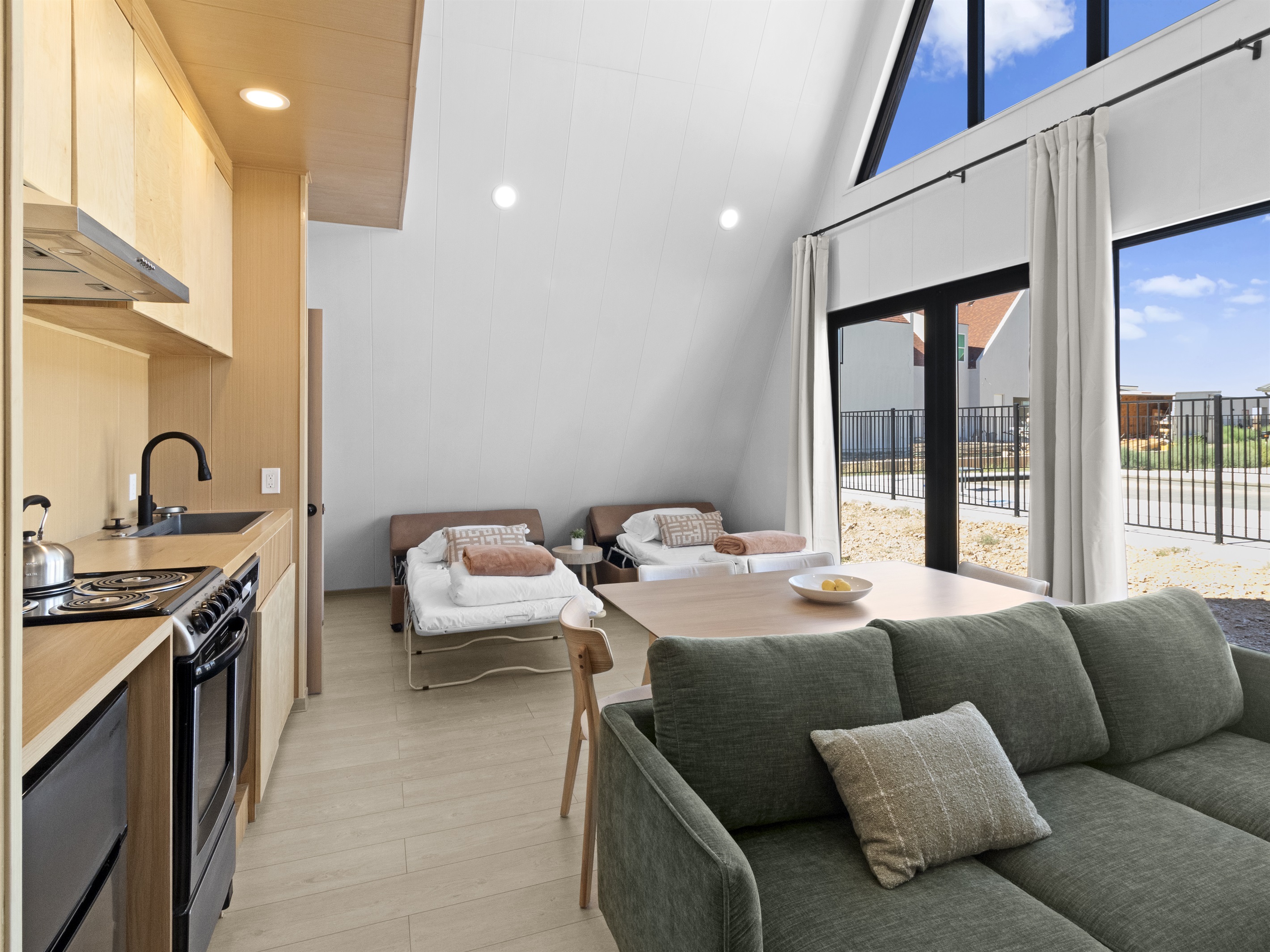 Main Room with Twin Sofa Beds Made Up