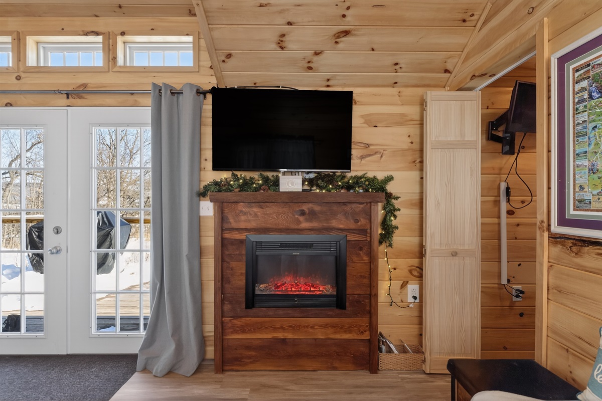 Cozy electric fireplace in the tiny house living room