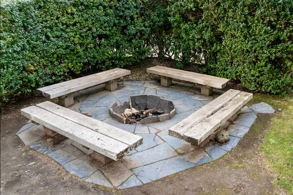 End the day around the community fire pit,  just steps away from the home, perfect for evening conversations and s'mores.