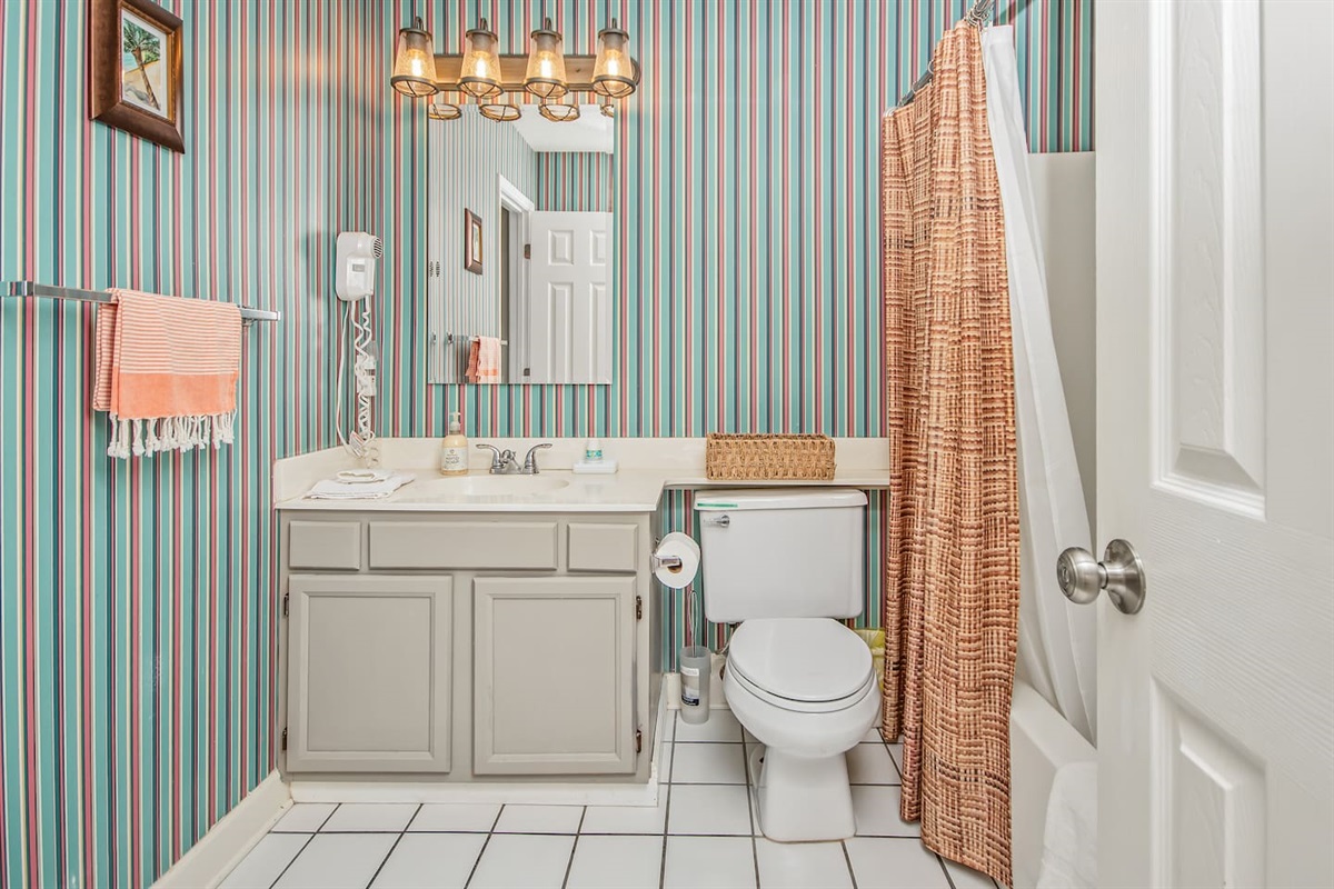 This bathroom is on the first floor and is accessible from both Bedroom number 1 and the laundry room.  