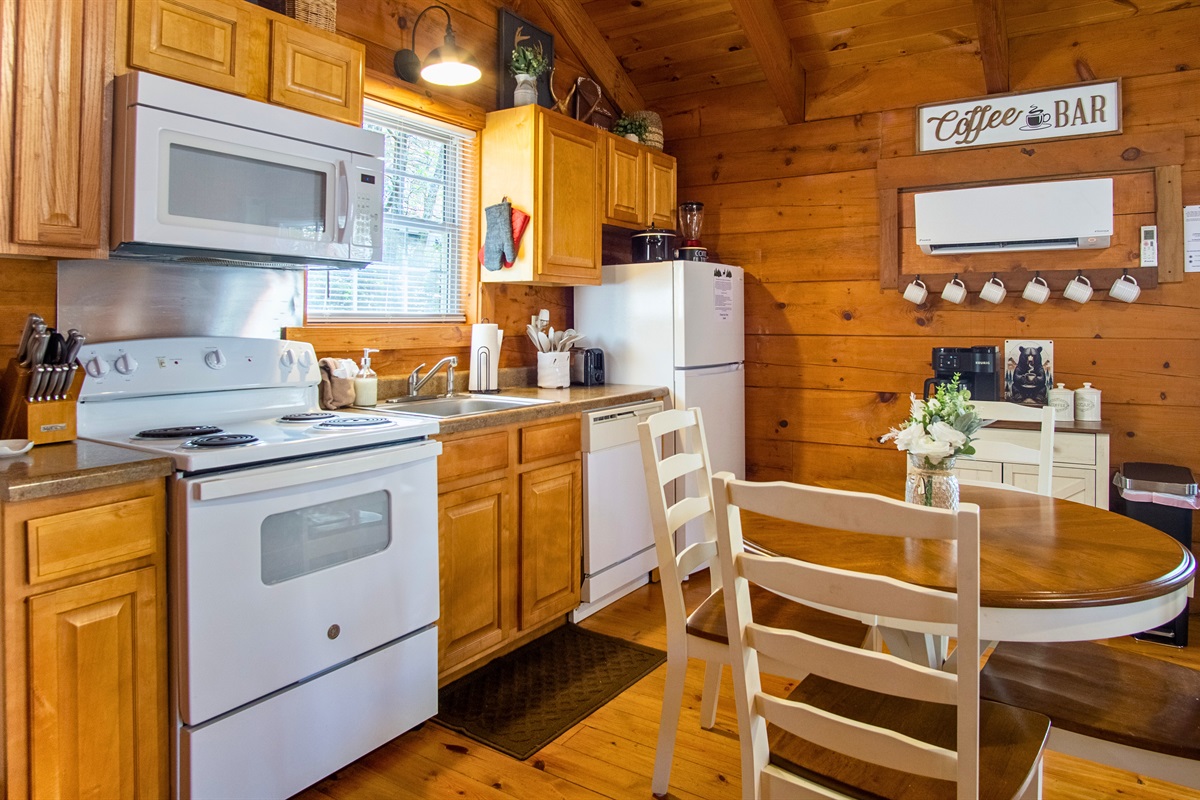 Fully equipped kitchen and dining area, perfect for home-cooked meals.