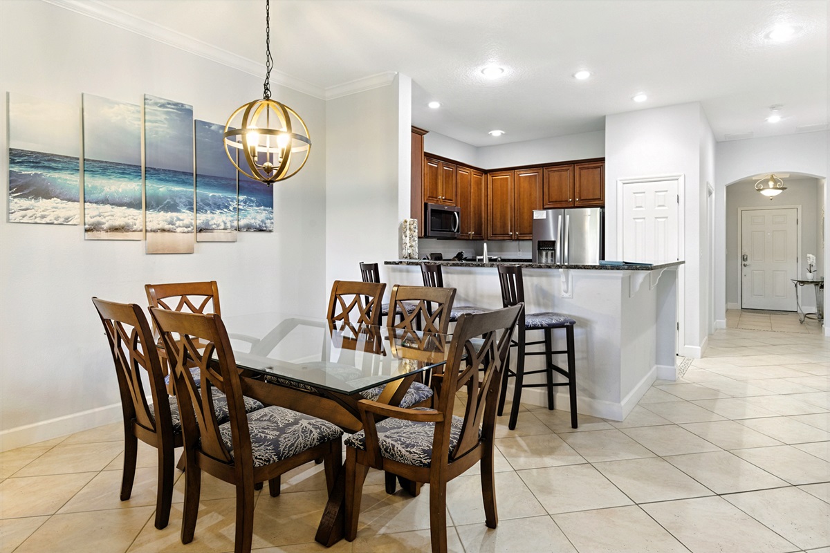 🍽️🌊 Gather, eat, and linger—this bright coastal dining space flows right into the open kitchen and breakfast bar, making it easy for everyone to stay connected from morning coffee to late-night snacks. ✨🍷
