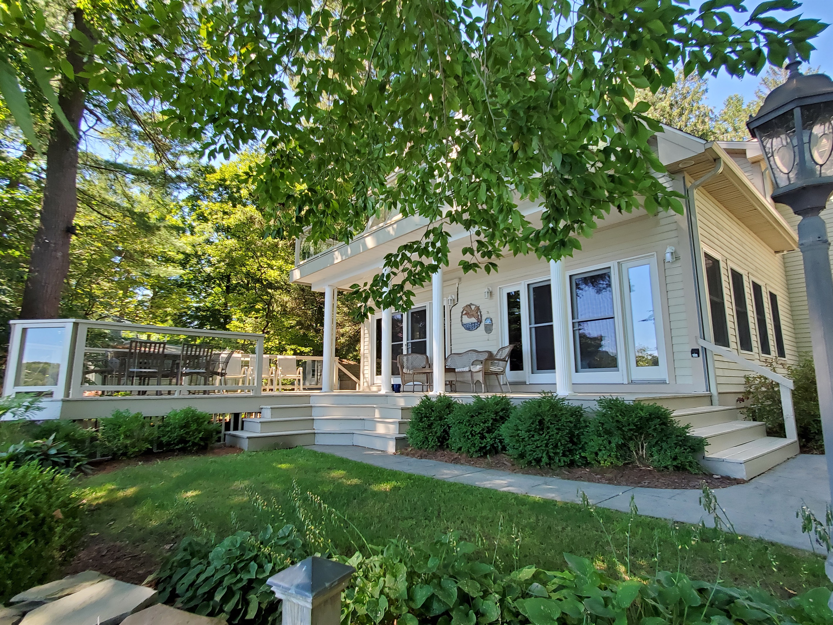 Take time to relax or dine on this gracious deck.