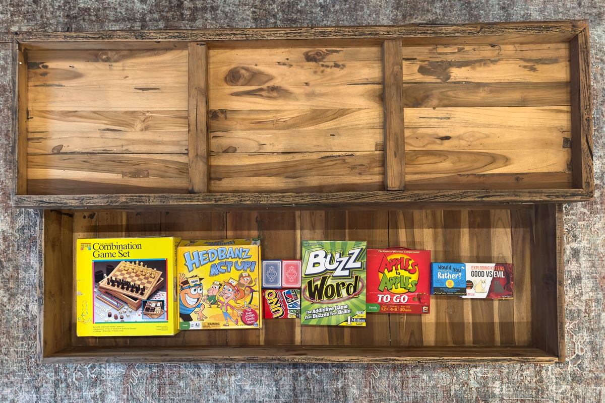 A peek inside the living room game drawer, fully stocked with family favorites for fun-filled nights together.
