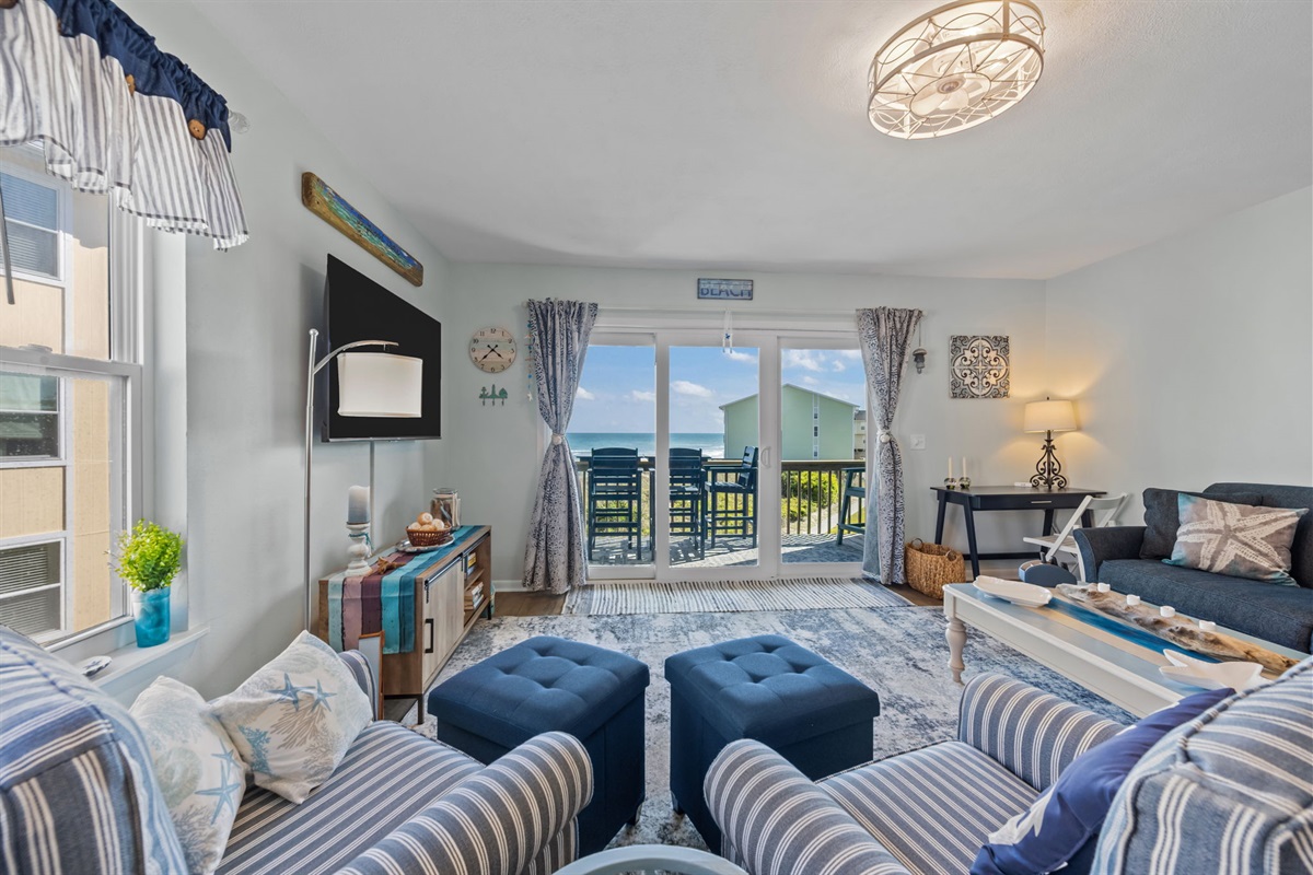 Settle in with comfortable seating and a front-row view of the ocean just beyond the doors