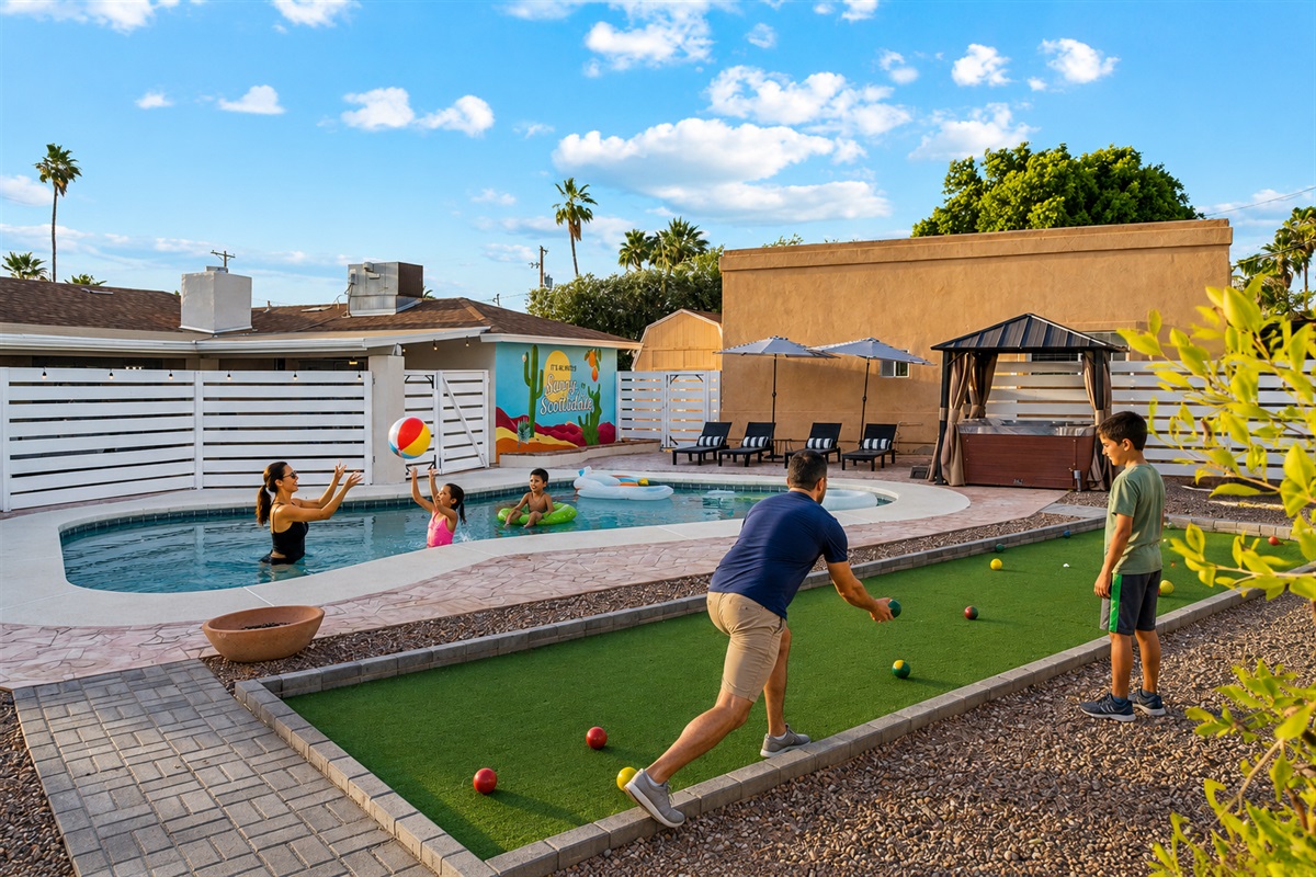 Enjoy the pool, hot tub, put put golf/bocce ball all in this shared back yard oasis.