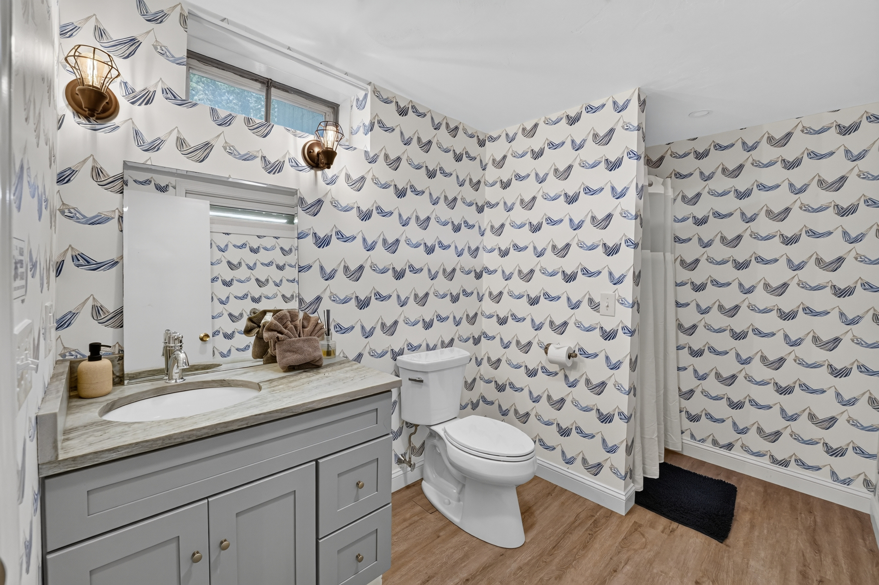 Convenient half bath located on the main level for guests.