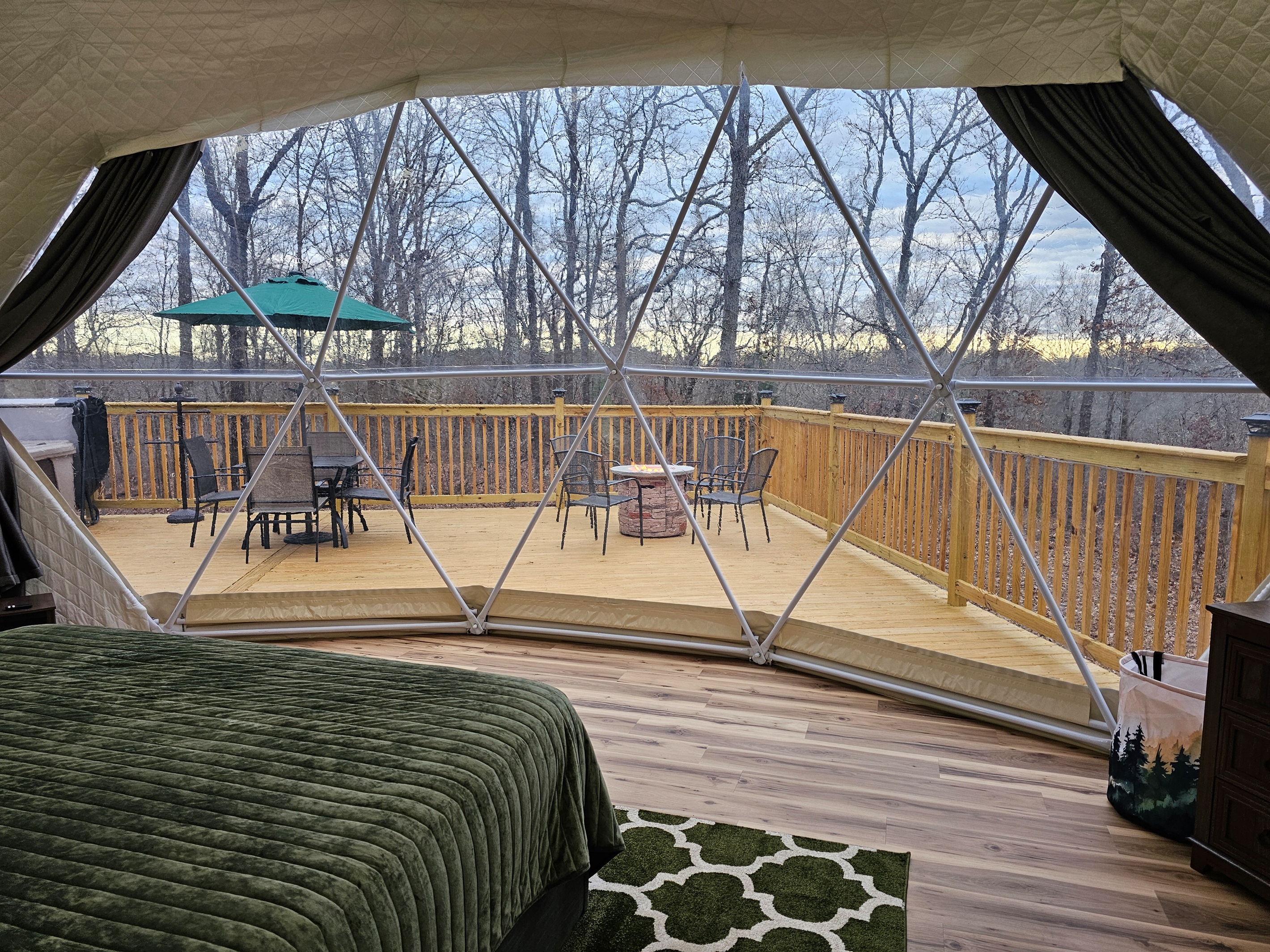 Wake up to the forest, just beyond your bed