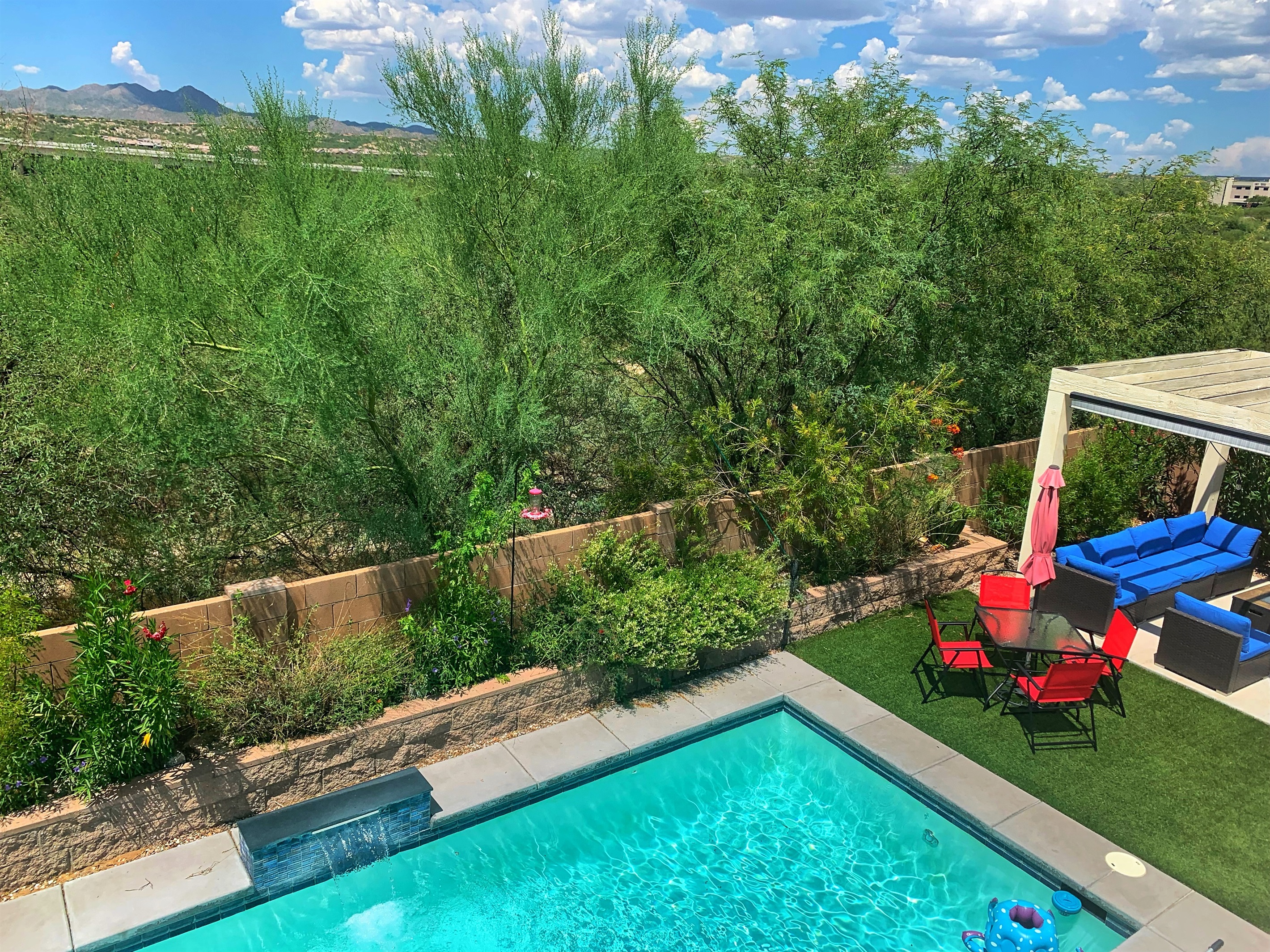 Relax and unwind in the private backyard and sparkling pool. No neighbors behind you.