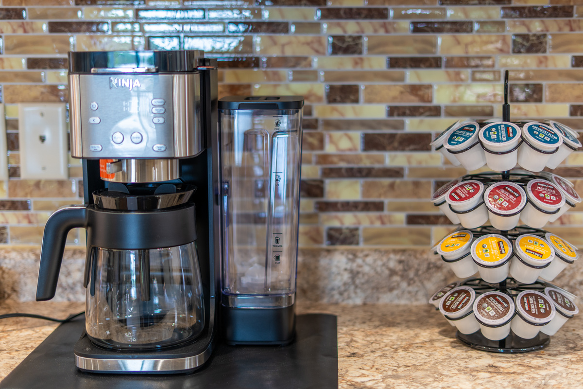 Your morning ritual starts here. Dual-brew Ninja coffee system, complimentary K-cups, and a full coffee bar setup - because great days start with great coffee
