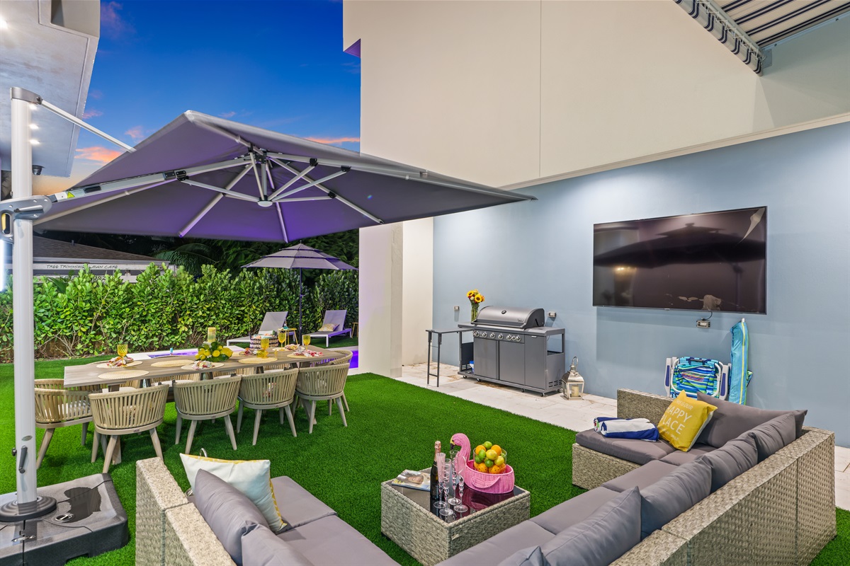 Evenings under the palms – gather for dinner al fresco with ambient lighting and resort-style seating.