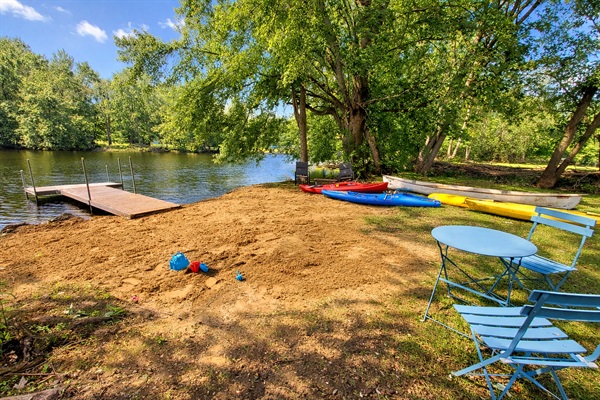 Quiet shoreline moments—our private beach with kayaks, canoe, paddle board, and space to slow down. Beach installed from the first day of summer break until the first frost. Unlike the busy, high-traffic lakes, the river offers a calmer place to paddle. 
