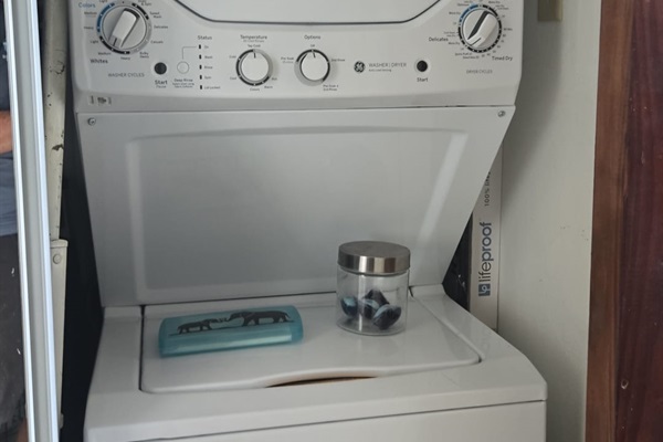 Washer and dryer in unit. 