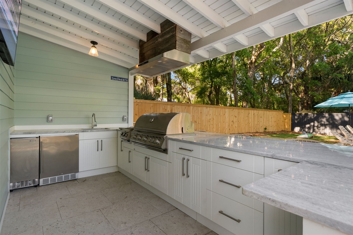 Outdoor Kitchen And Bar With Gourmet Grill, Beer and Wine Fridge, Ice Maker, and 65" Smart TV | IOP Escapes Beach Blessing | 3705 Hartnett Blvd, Isle of Palms, SC