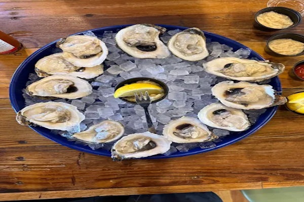 Shuck Me – Seafood & patio dining (8–9 min drive)