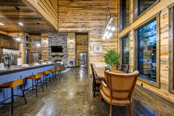 Modern rustic luxury: a sun-drenched space for dining and relaxing.