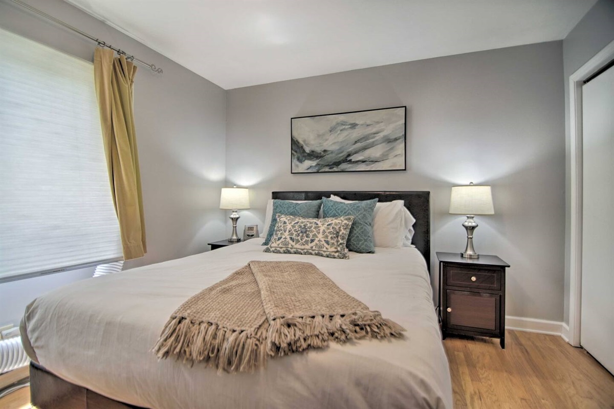 3Bd Unit: The private first floor master bedroom has a queen size bed, window AC, and ceiling fan (not shown) for your sleeping comfort. 