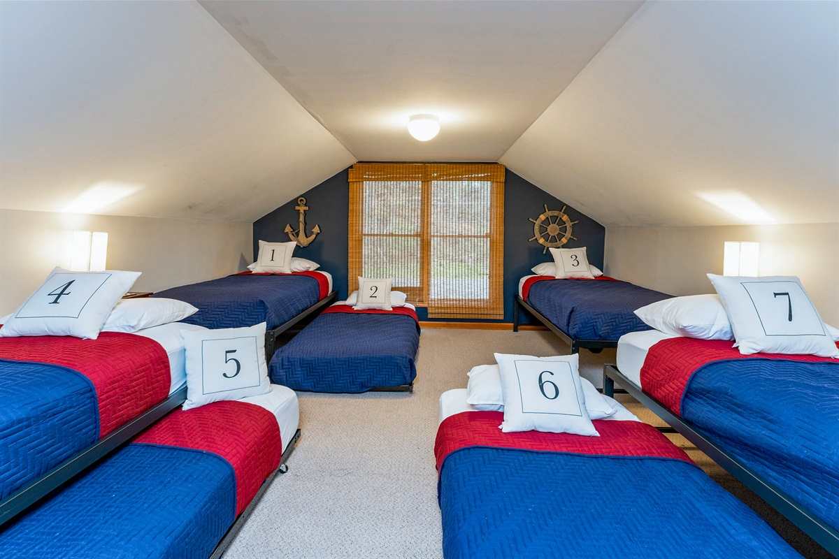 Upstairs bunk room with 8 twin beds