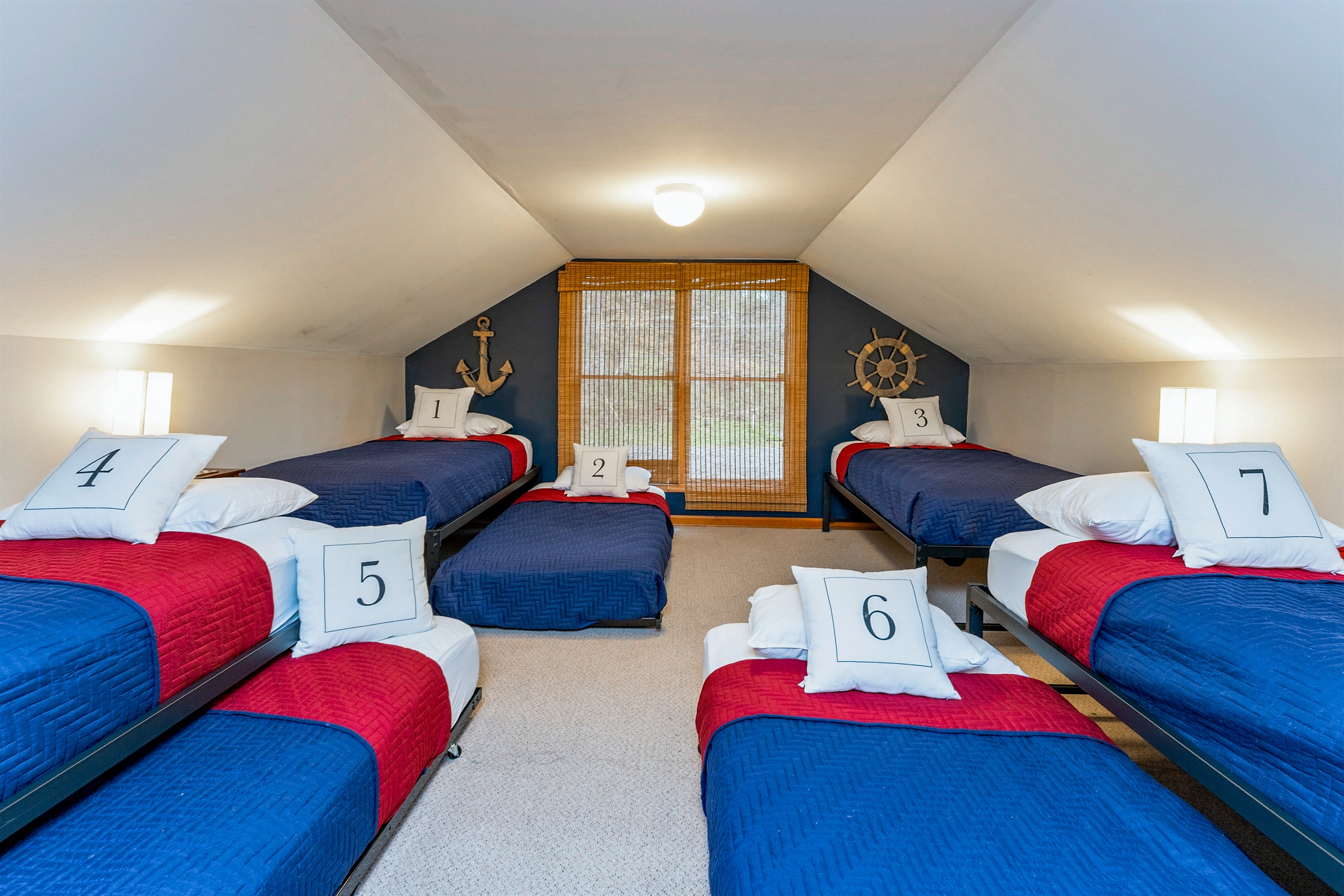 Upstairs bunk room with 8 twin beds