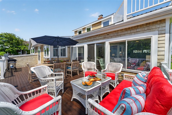Comfortable outdoor furniture provides the perfect spot to relax and enjoy the fresh coastal air.