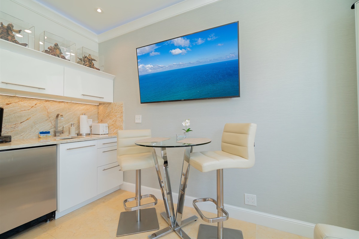 New wallpaper on dining wall for interest.  