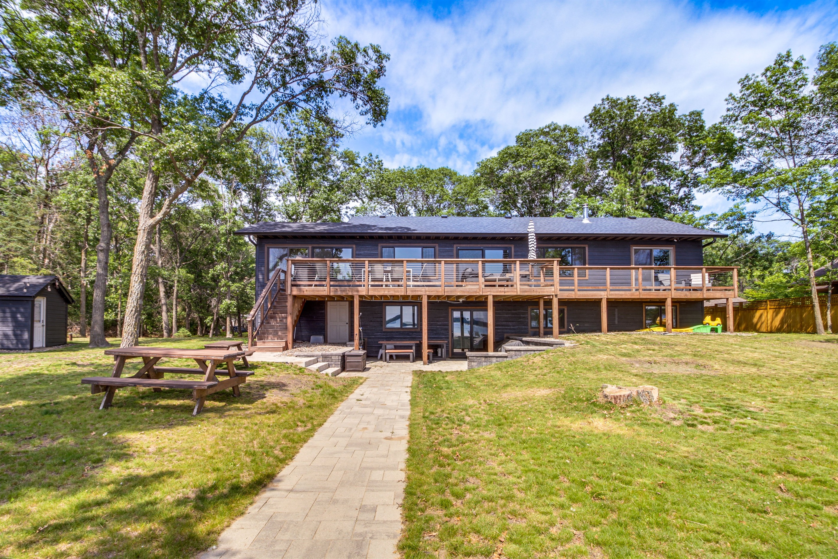 Lakefront home with expansive deck overlooking White Sand Lake