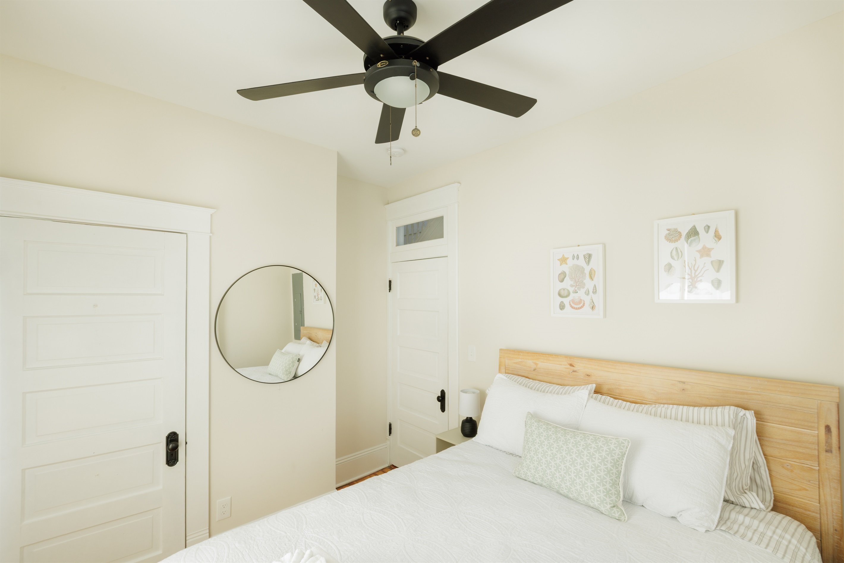 Large Queen Bedroom with extra seating, clothing storage.