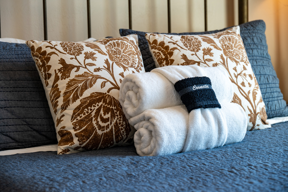 Thoughtful touches and plush linens help create a warm and welcoming stay.