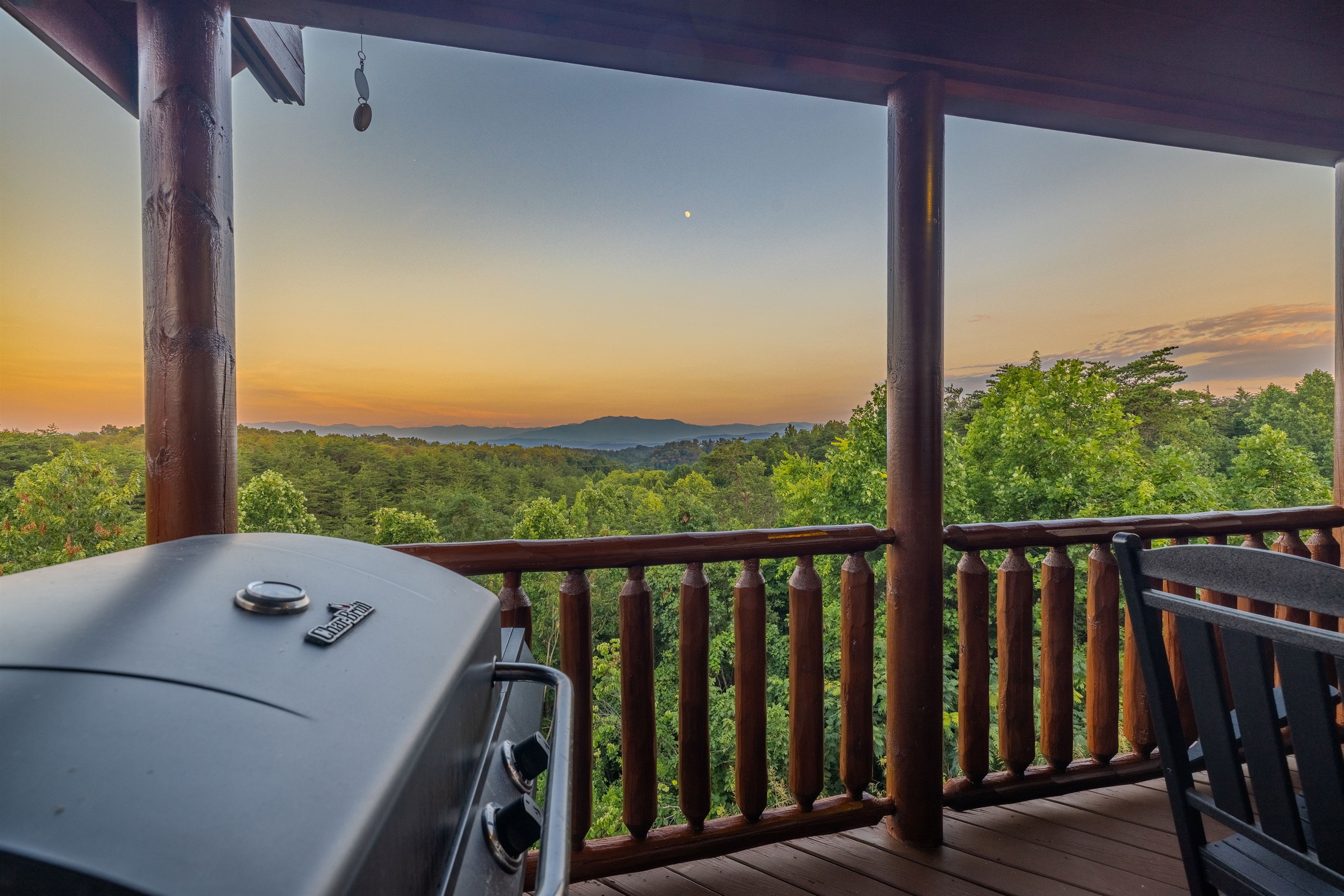 Enjoy the fall beauty from the upper deck, as lights begin to twinkle from nearby Pigeon Forge and Mount LeConte.