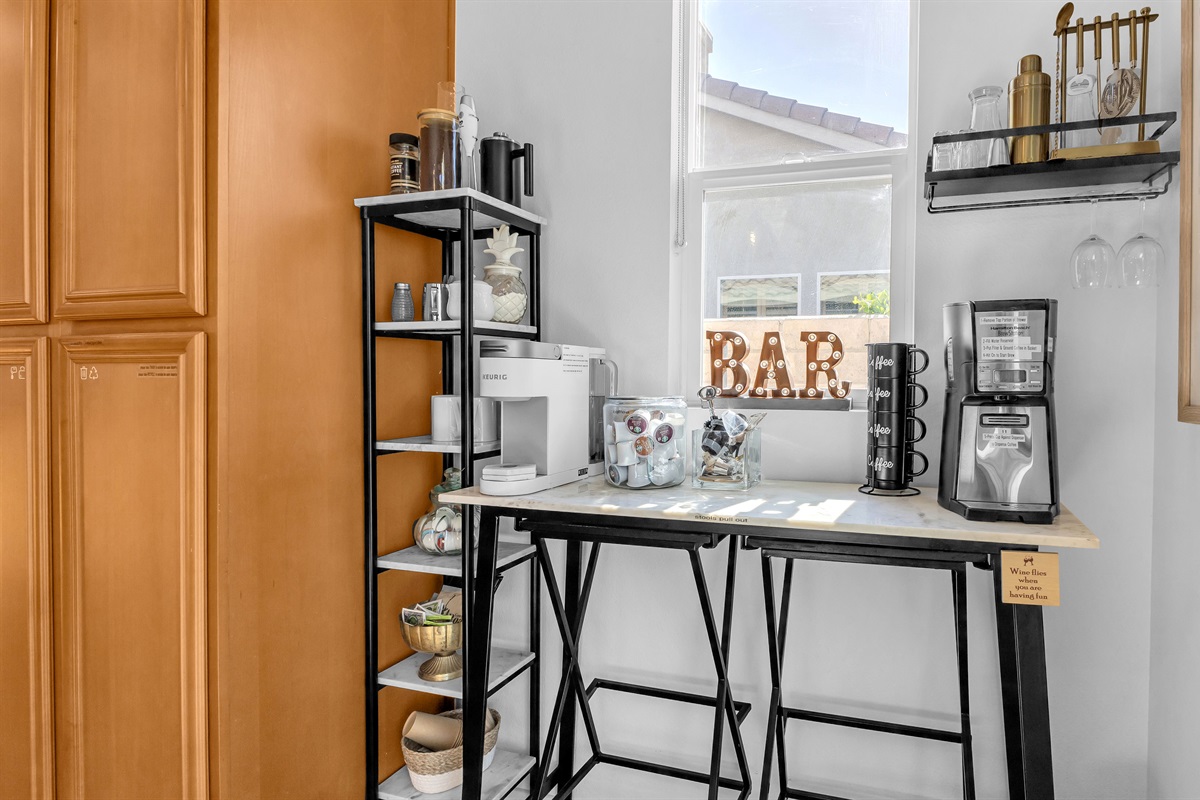 Enjoy the convenience of a complete coffee bar with Keurig, drip coffee maker, and everything you need to sip and relax.