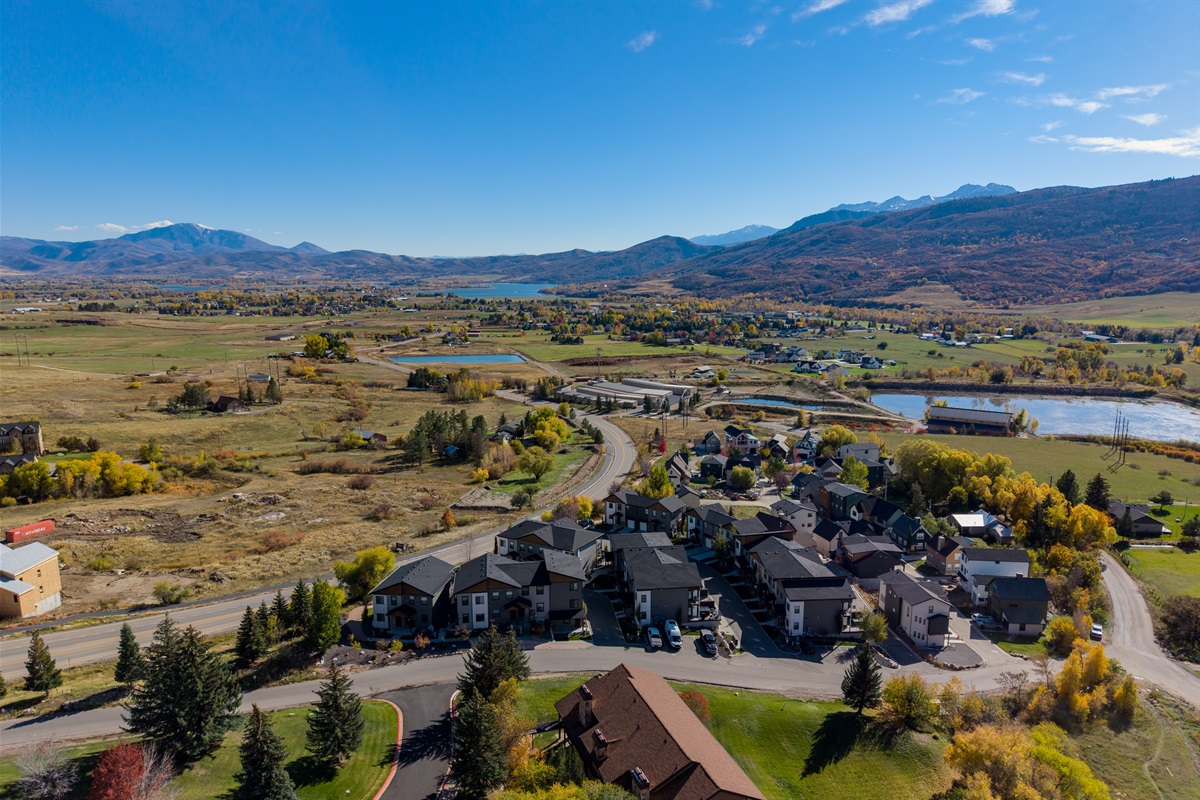 Aerial panorama of Eden Valley, Pineview Reservoir, and The Peaks.