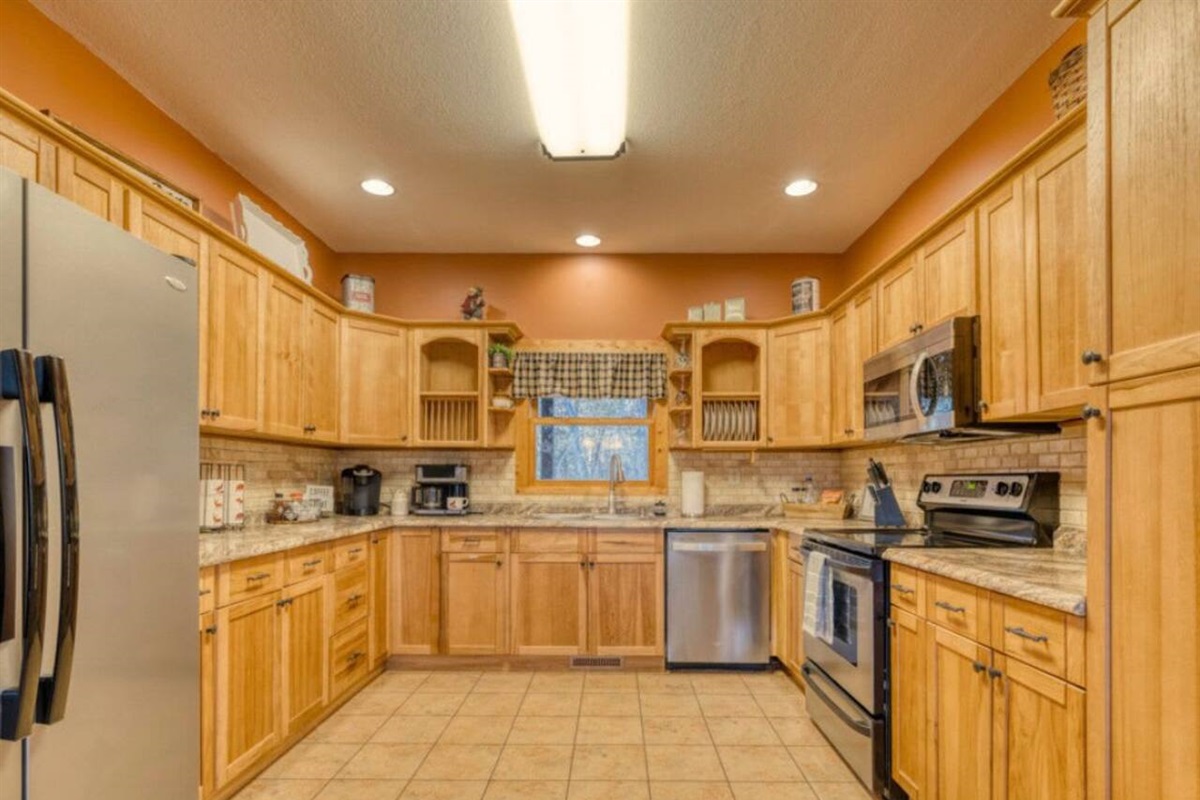 The kitchen area is fully equipped with all amenities.