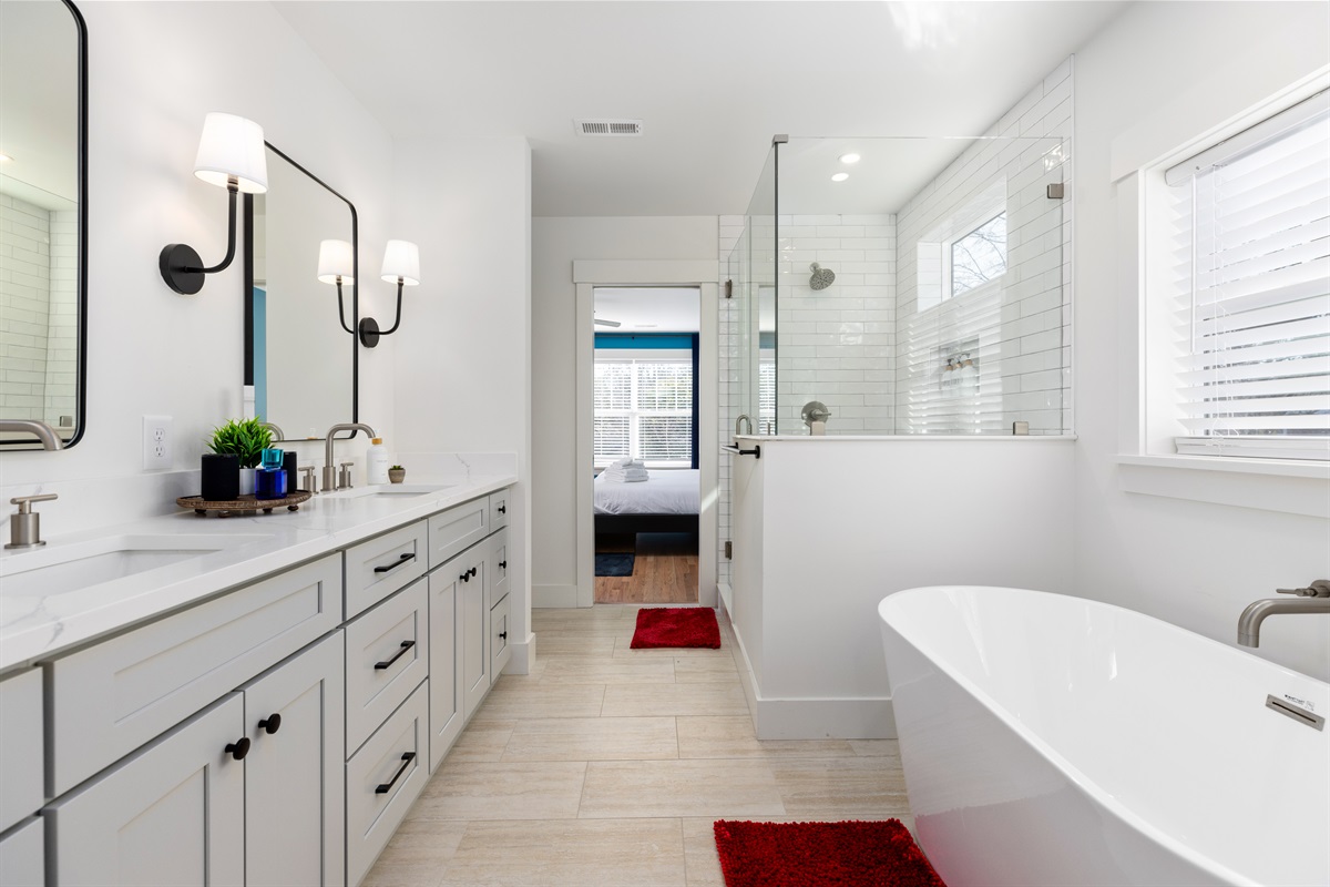 The luxury ensuite includes a tub and a walk-in shower.
