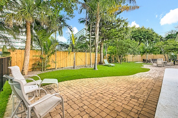 Large separately fenced in area that gives another big turf location. Good for playing or just hanging. 