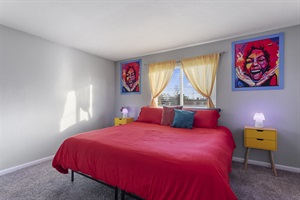 Bold colors, big comfort, and a private bath to match — this king bedroom with ensuite is the perfect place to unwind.