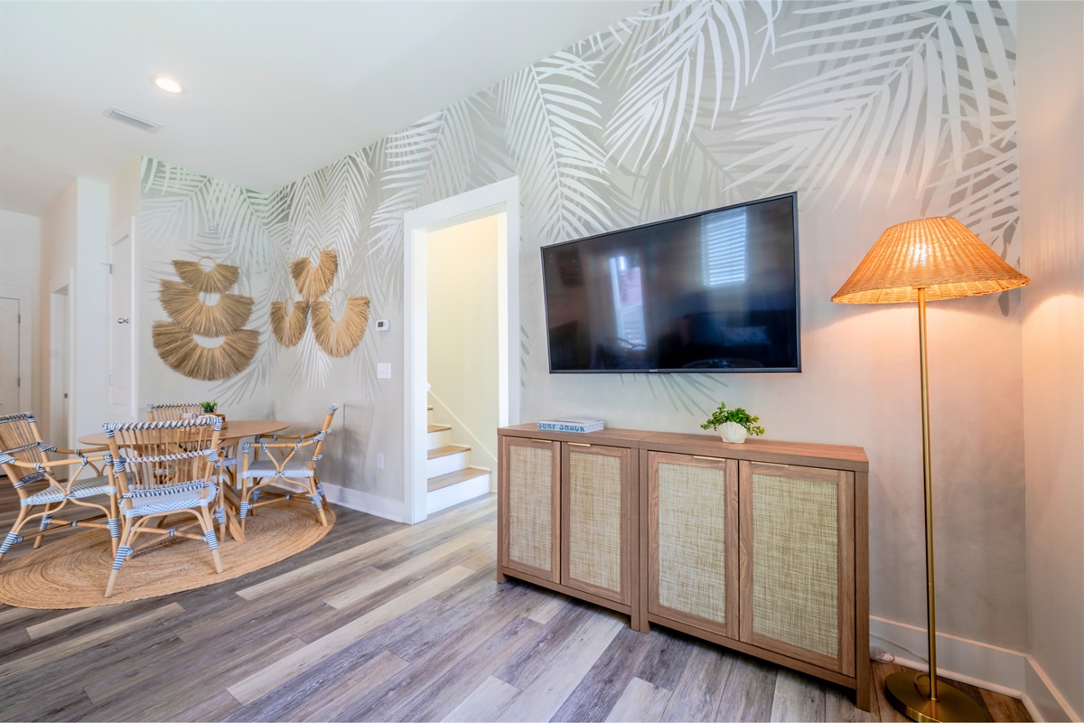 Enjoy the Smart TV for streaming and a sideboard stocked with board and card games for all-day fun