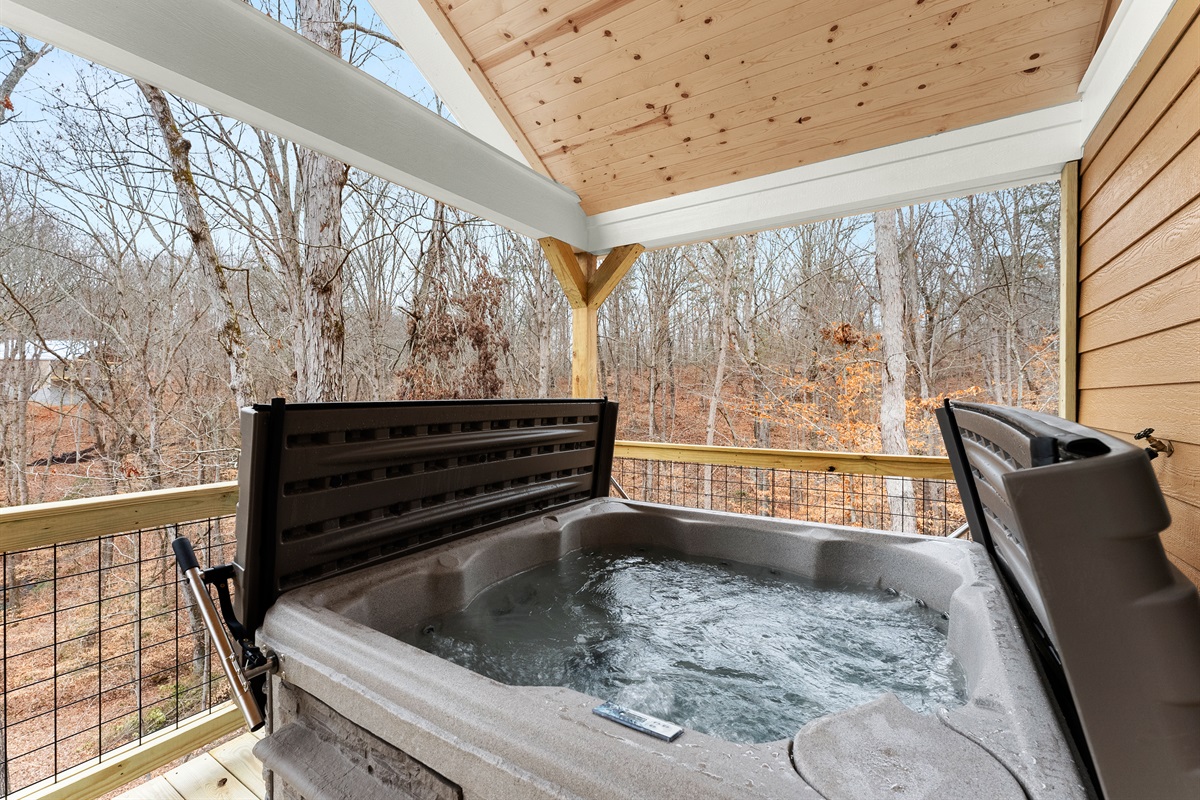 Relax in your private outdoor hot tub.  High end hot tub with hard cover top.
