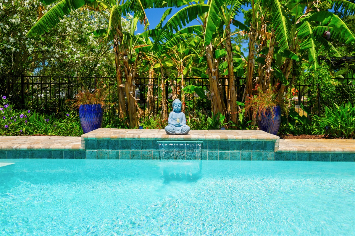 A detailed shot showcasing the pool's waterfall