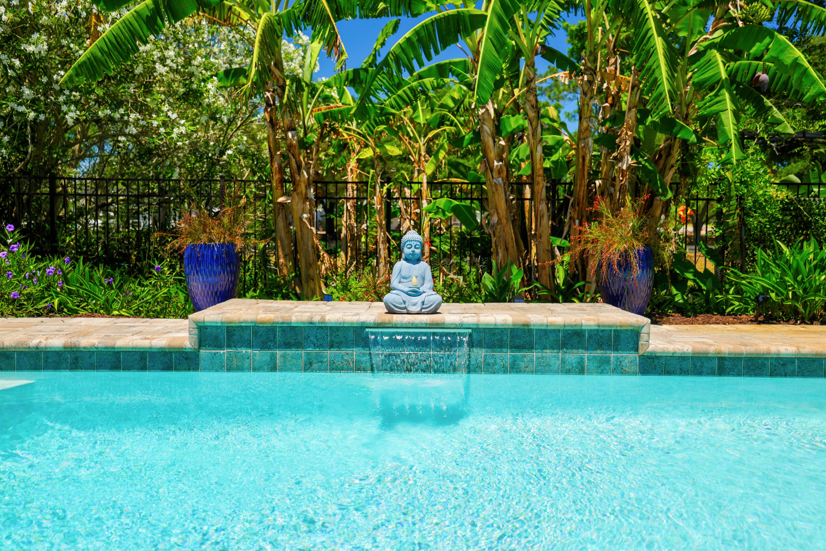 A detailed shot showcasing the pool's waterfall