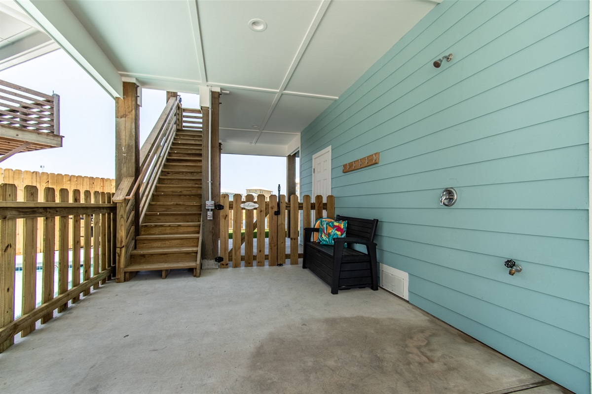 Outdoor shower and storage for beach supplies