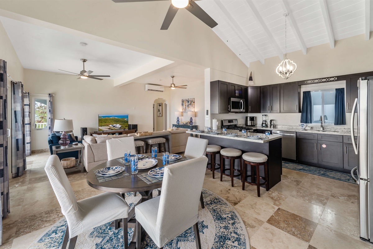 Gather around for meals with your loved ones at the spacious dining table.