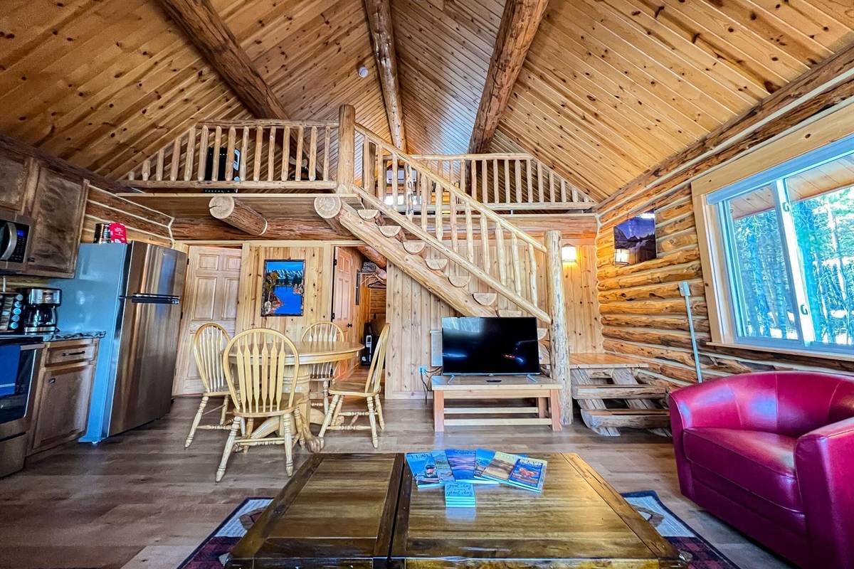 Living room with upstairs loft