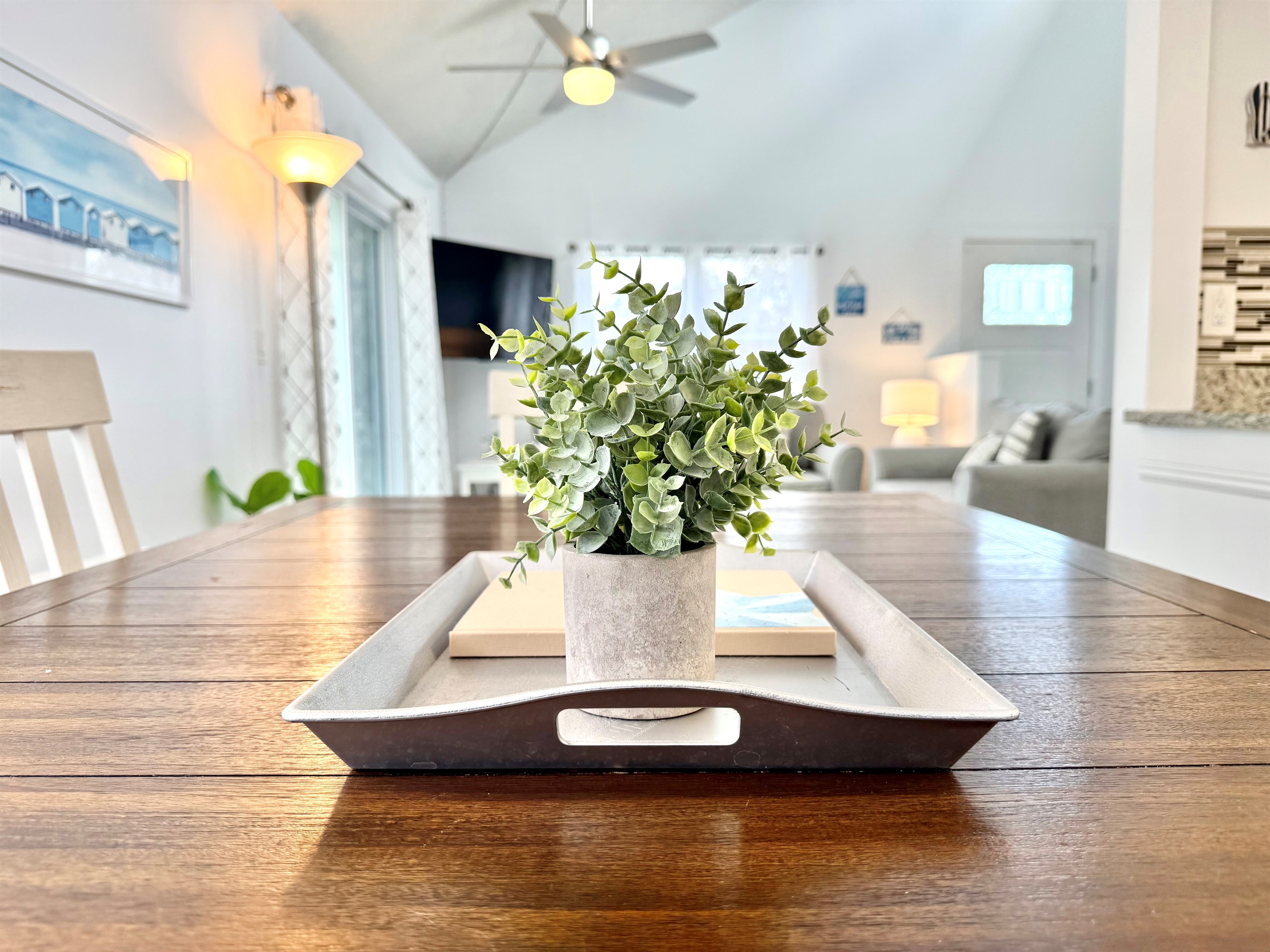 This charming dining space seats four and is the perfect spot for family meals or game nights.