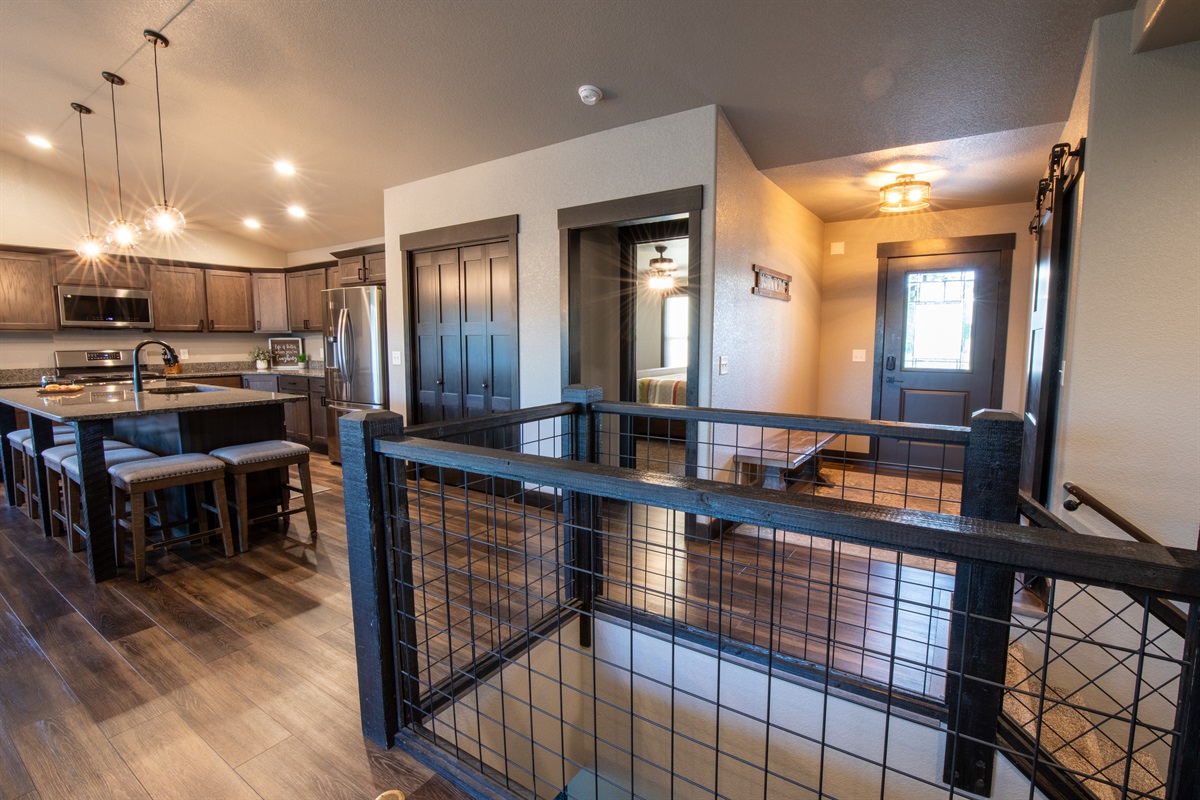 Walk into warmth and style—gather in the open kitchen for snacks, laughter, and planning your next Black Hills adventure.